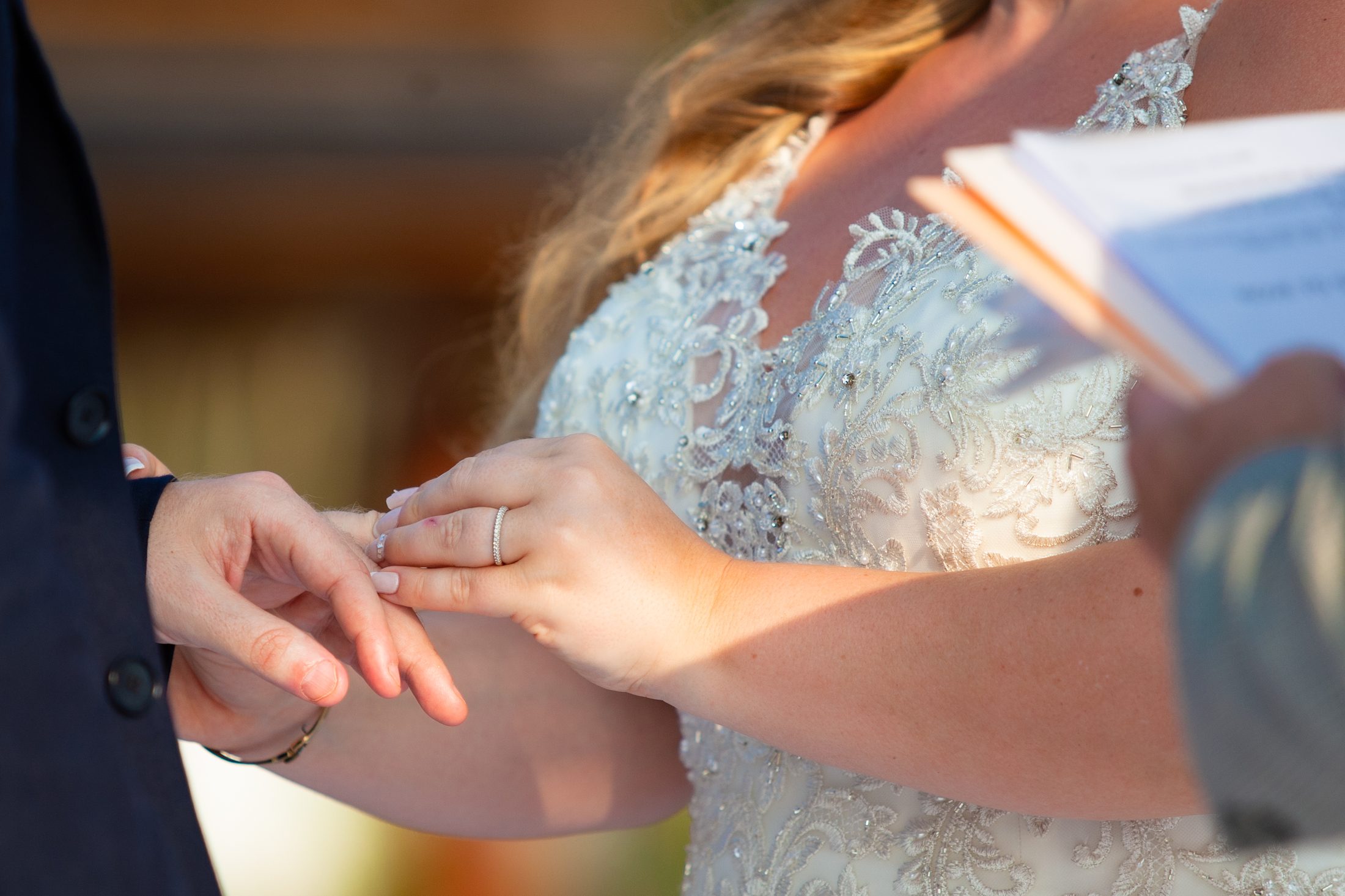 Ring exchange during Bekki and Glen's ceremony at Villa Jia