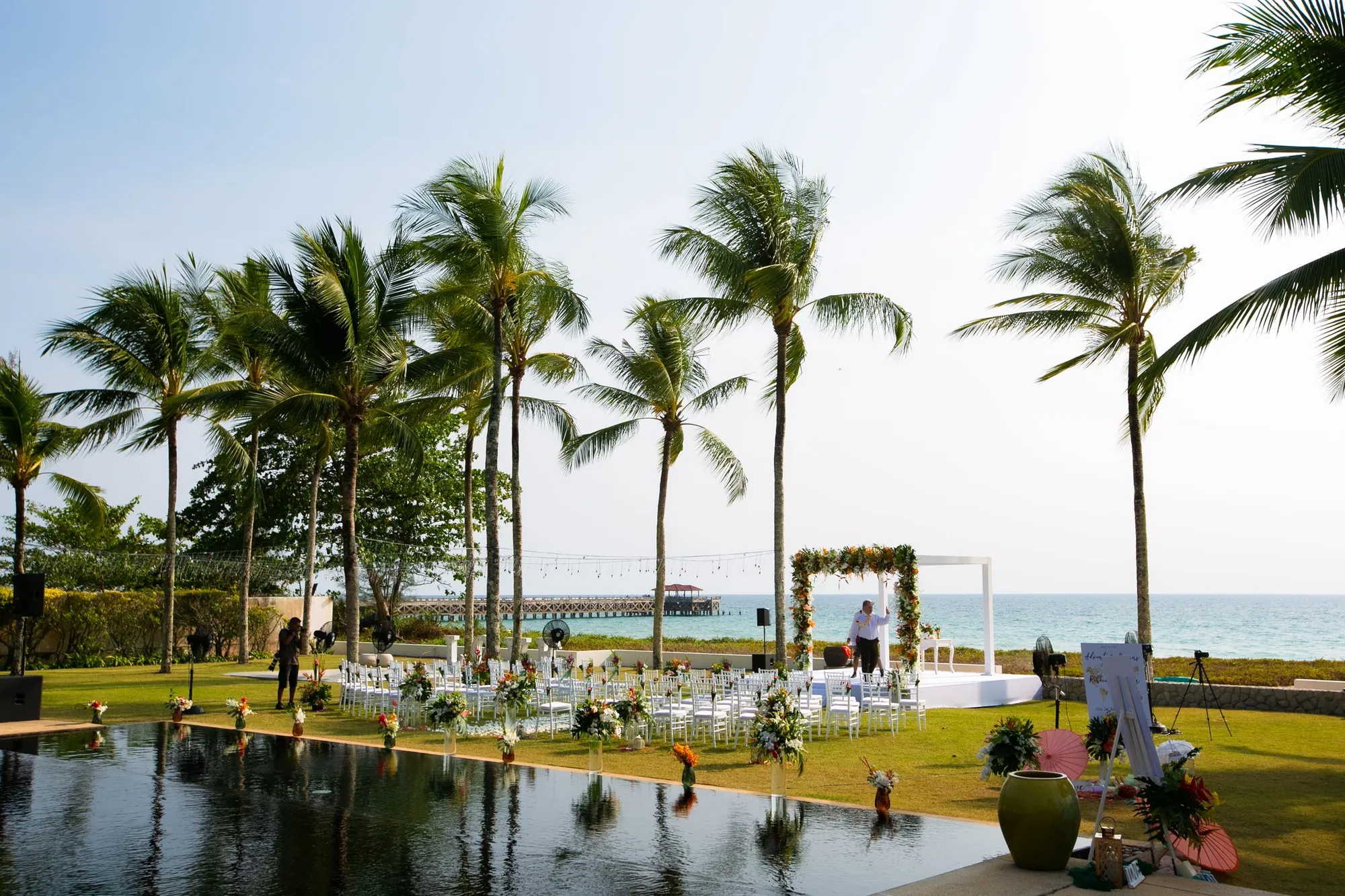 Villa Jia's beachfront ceremony arch and reflecting pond on the morning of Bekki and Glen's wedding, Natai Beach