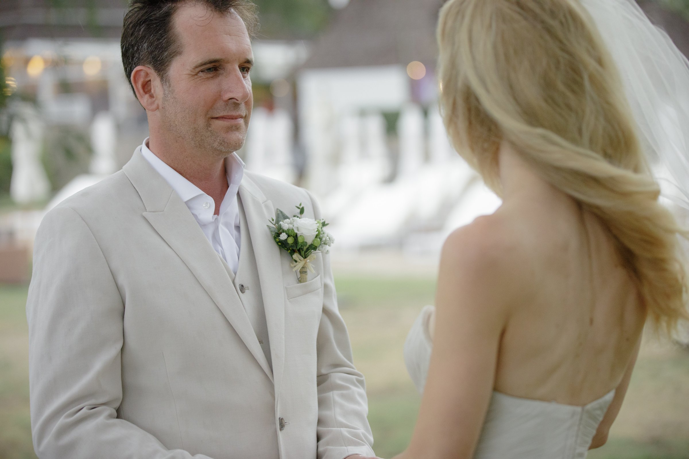 Anne and Jeremy in a quiet portrait moment after their beach ceremony at Anantara Mai Khao