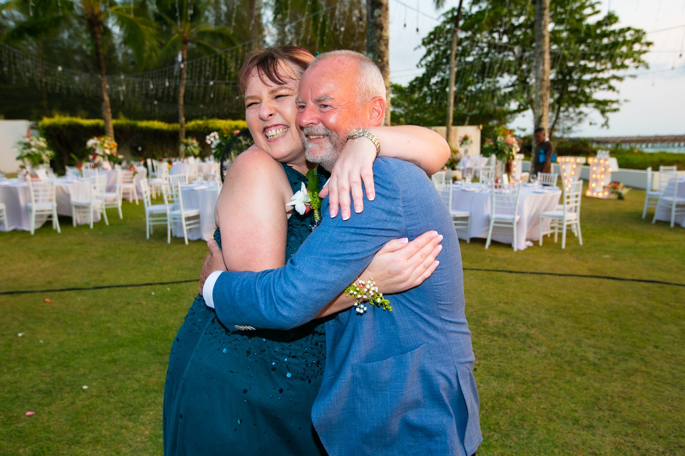 Bekki and her father share an emotional embrace at Villa Jia after the ceremony