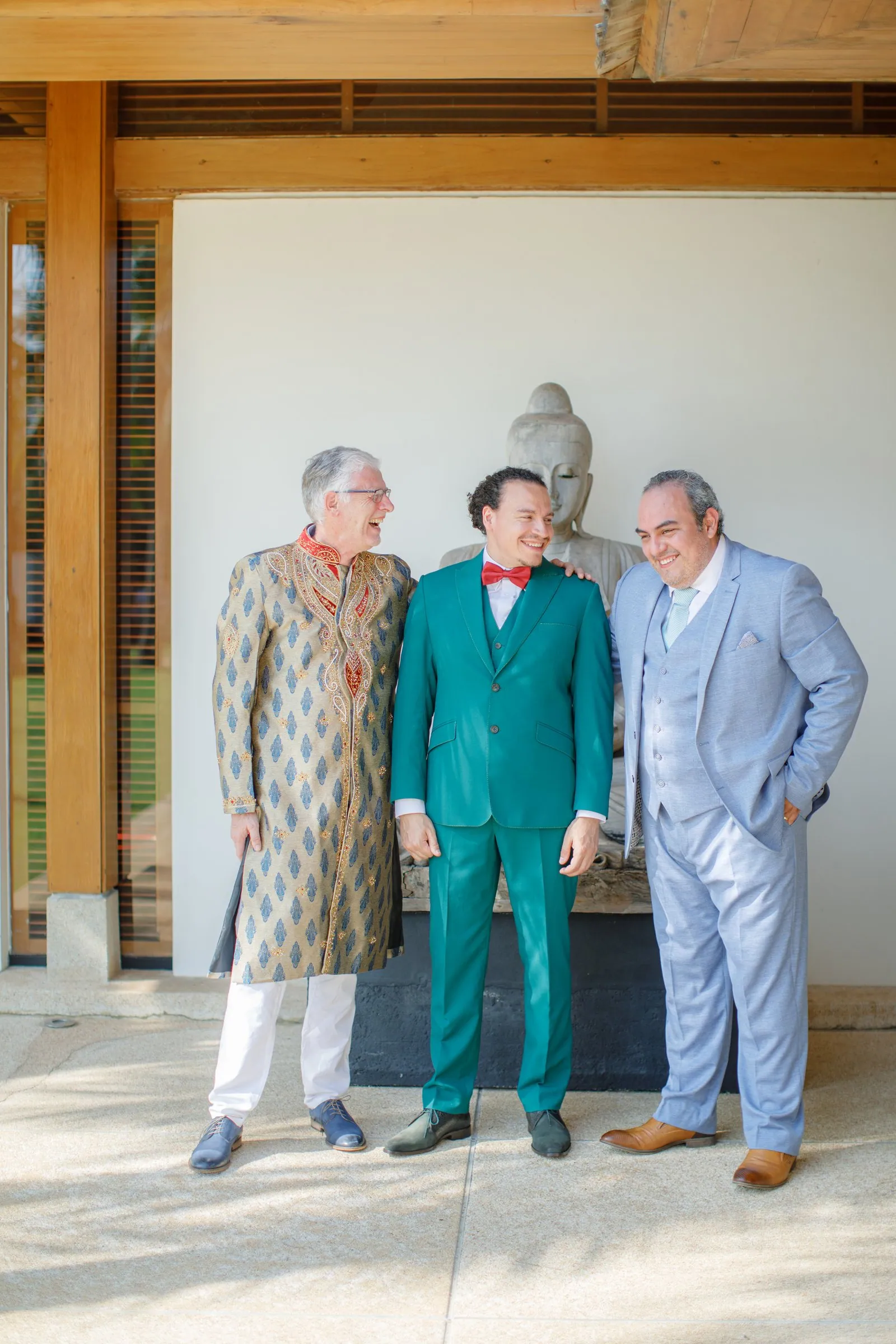 Victor with his father and best man at Villa Shanti before the ceremony, all in the wedding-party palette