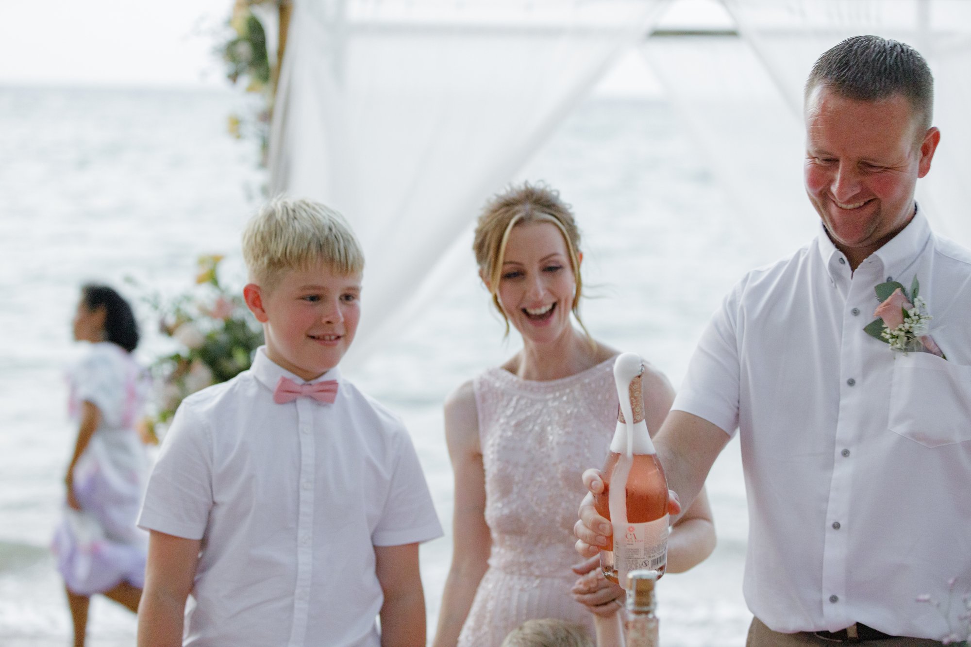 Amanda with her sons George and Harry, the ring bearers, after the ceremony at Hua Beach