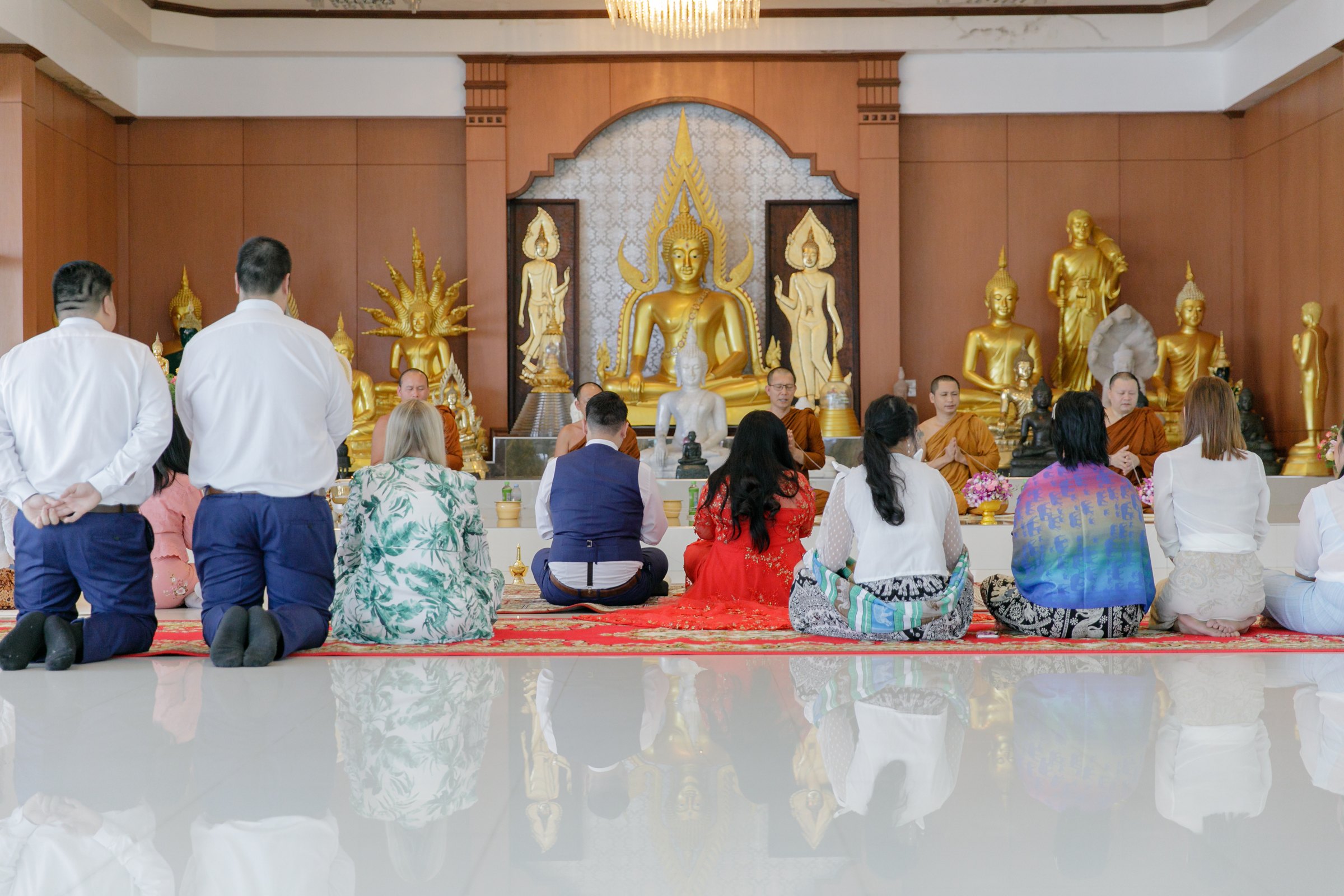 Alan and Thuy receiving a traditional Thai monks blessing at Wat Doi Thep Nimitr, Phuket