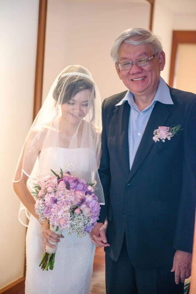 The bride with her father about to walk down the aisle at Villa Sanyanga