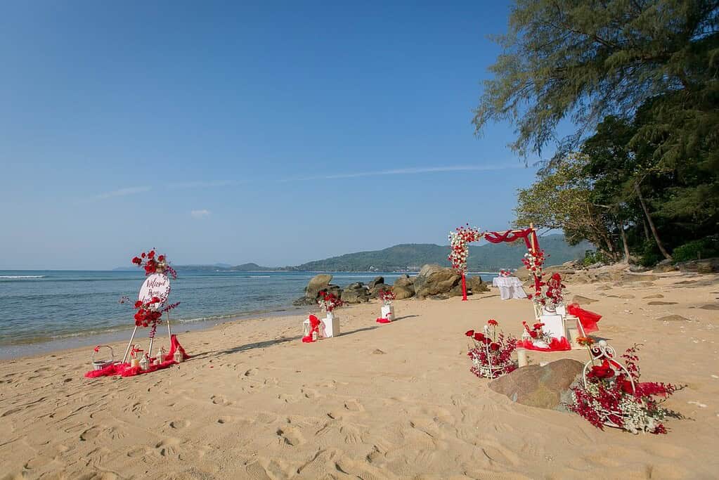Remote beach vow renewal ceremony setup in Phuket Thailand