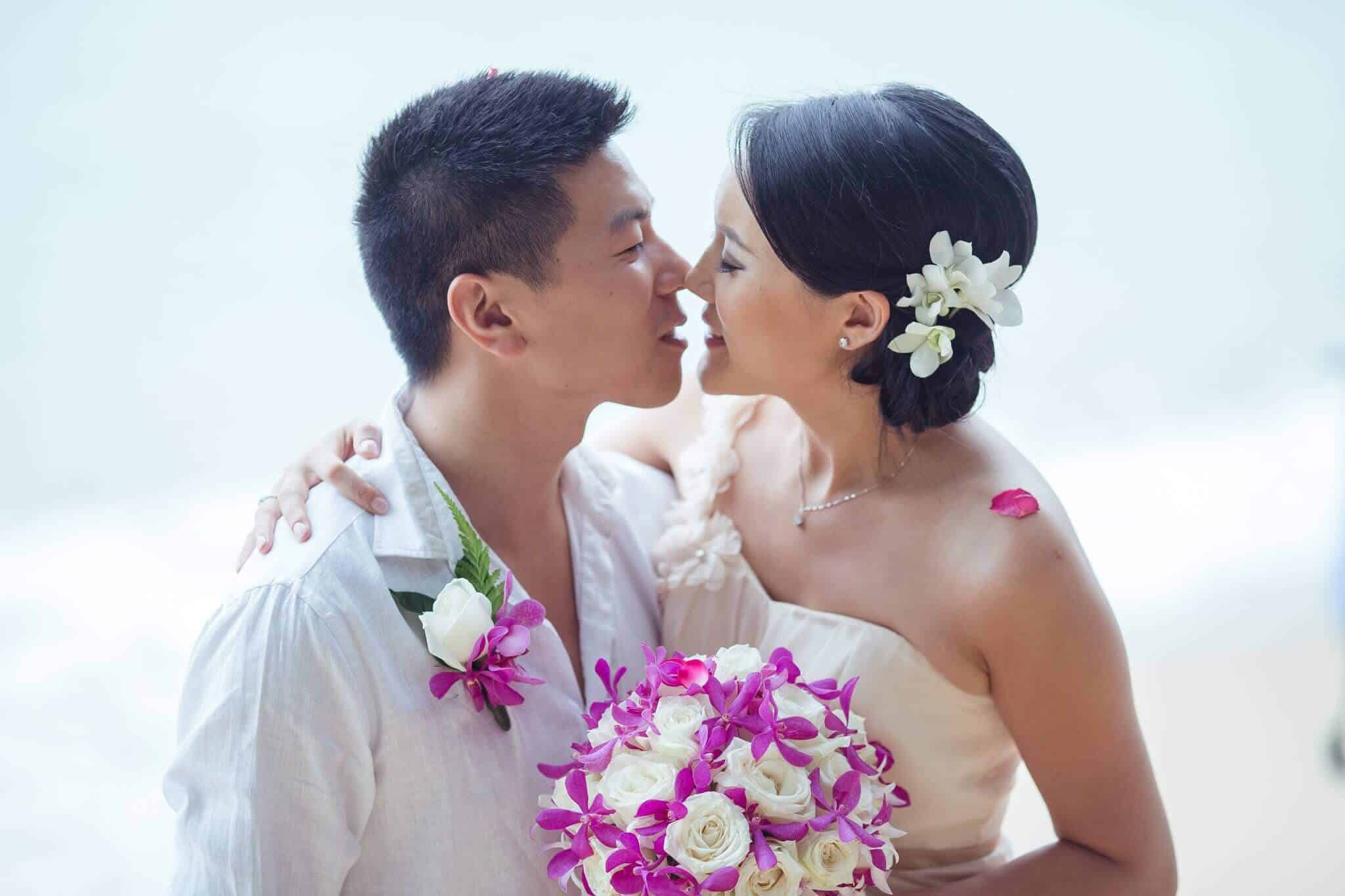 Phuket Beach Wedding - Kiss Bride and Groom